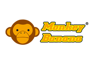 Monkey-Banana Logo coloré de Monkey Banana, incluant une illustration d'une tête de singe et le nom de la marque en jaune sur un fond marron.